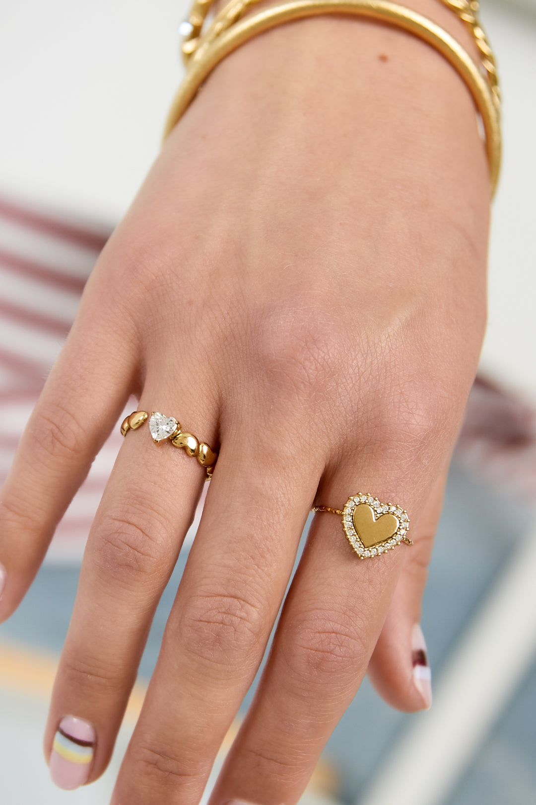 Ring met wisselende harten en zirkonia